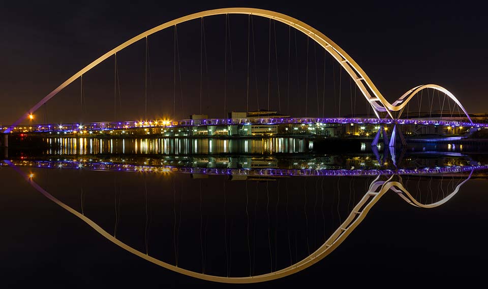 Stockton Infinity Bridge at night